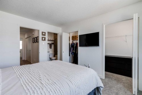 160 Walden Path Se, Calgary, AB - Indoor Photo Showing Bedroom