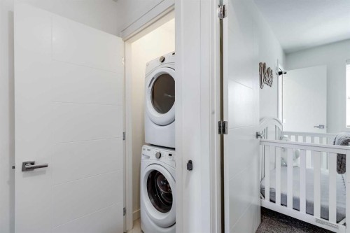160 Walden Path Se, Calgary, AB - Indoor Photo Showing Laundry Room