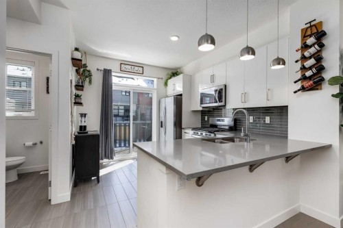 160 Walden Path Se, Calgary, AB - Indoor Photo Showing Kitchen With Double Sink
