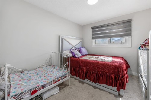 259 Manora Crescent Ne, Calgary, AB - Indoor Photo Showing Bedroom