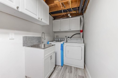 259 Manora Crescent Ne, Calgary, AB - Indoor Photo Showing Laundry Room