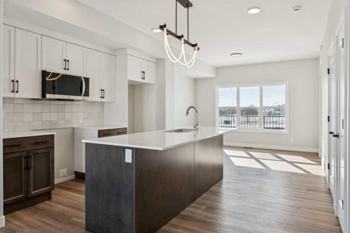 17 Gray Close, Sylvan Lake, AB - Indoor Photo Showing Kitchen With Upgraded Kitchen