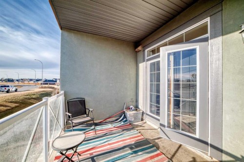 206-1005B Westmount Drive, Strathmore, AB - Outdoor With Balcony With Exterior