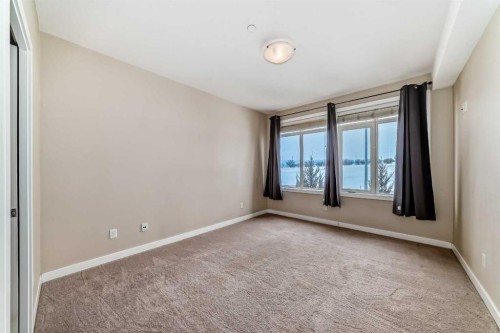 206-1005B Westmount Drive, Strathmore, AB - Indoor Photo Showing Other Room