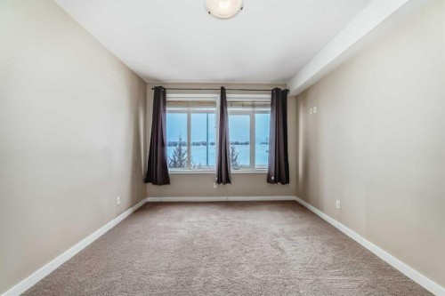 206-1005B Westmount Drive, Strathmore, AB - Indoor Photo Showing Other Room