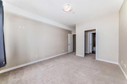206-1005B Westmount Drive, Strathmore, AB - Indoor Photo Showing Other Room