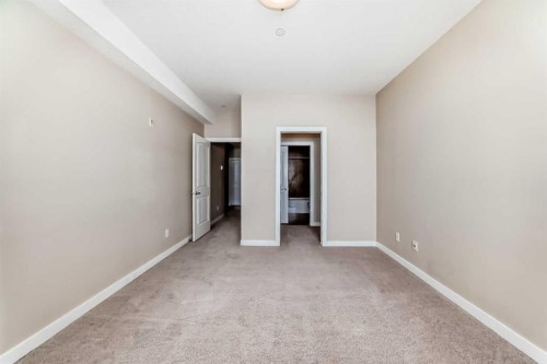 206-1005B Westmount Drive, Strathmore, AB - Indoor Photo Showing Other Room
