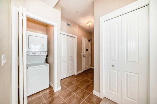 206-1005B Westmount Drive, Strathmore, AB - Indoor Photo Showing Laundry Room
