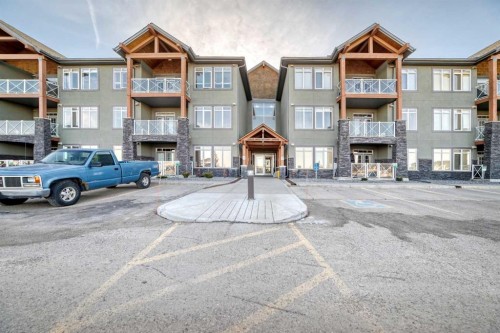 206-1005B Westmount Drive, Strathmore, AB - Outdoor With Balcony With Facade