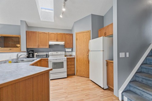 78 Coventry View Ne, Calgary, AB - Indoor Photo Showing Kitchen With Double Sink