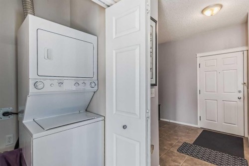 9303-70 Panamount Drive Nw, Calgary, AB - Indoor Photo Showing Laundry Room