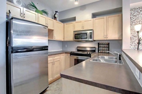 9303-70 Panamount Drive Nw, Calgary, AB - Indoor Photo Showing Kitchen With Double Sink