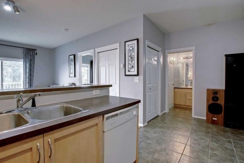 9303-70 Panamount Drive Nw, Calgary, AB - Indoor Photo Showing Kitchen With Double Sink