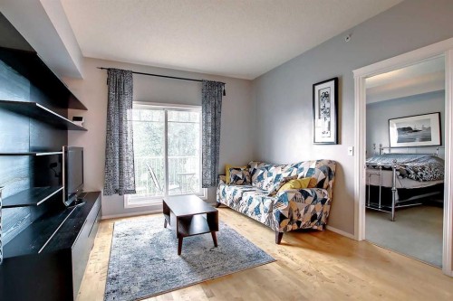 9303-70 Panamount Drive Nw, Calgary, AB - Indoor Photo Showing Living Room