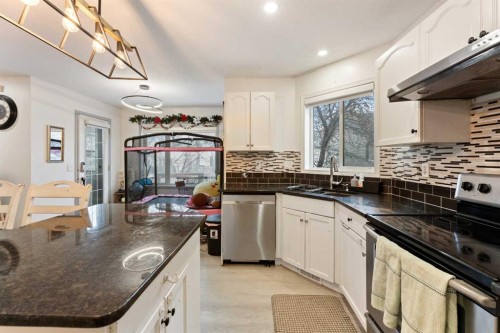 140 Fairways Drive Nw, Airdrie, AB - Indoor Photo Showing Kitchen