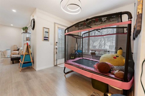 140 Fairways Drive Nw, Airdrie, AB - Indoor Photo Showing Other Room