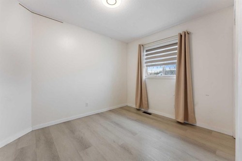 140 Fairways Drive Nw, Airdrie, AB - Indoor Photo Showing Other Room