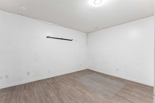 140 Fairways Drive Nw, Airdrie, AB - Indoor Photo Showing Other Room