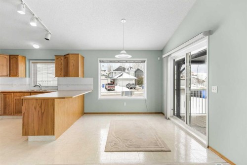 302 Arbour Ridge Park Nw, Calgary, AB - Indoor Photo Showing Kitchen