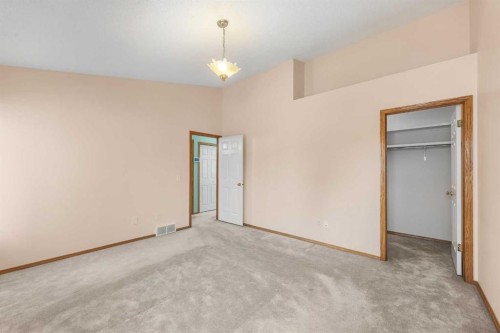 302 Arbour Ridge Park Nw, Calgary, AB - Indoor Photo Showing Other Room