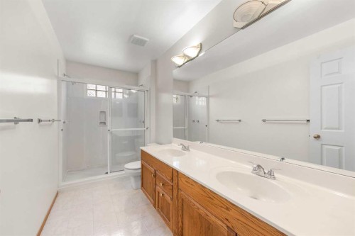 302 Arbour Ridge Park Nw, Calgary, AB - Indoor Photo Showing Bathroom