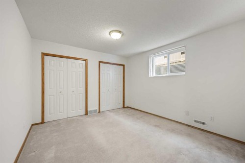302 Arbour Ridge Park Nw, Calgary, AB - Indoor Photo Showing Other Room