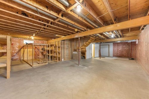 302 Arbour Ridge Park Nw, Calgary, AB - Indoor Photo Showing Basement