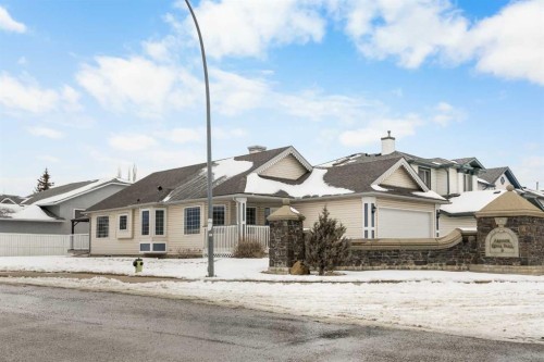 302 Arbour Ridge Park Nw, Calgary, AB - Outdoor