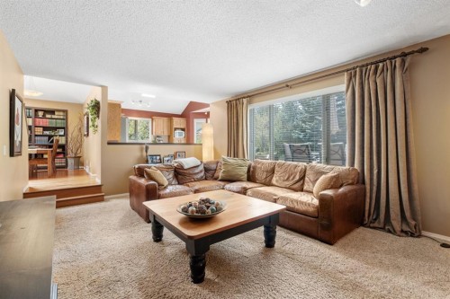 212 Sirocco Place Sw, Calgary, AB - Indoor Photo Showing Living Room