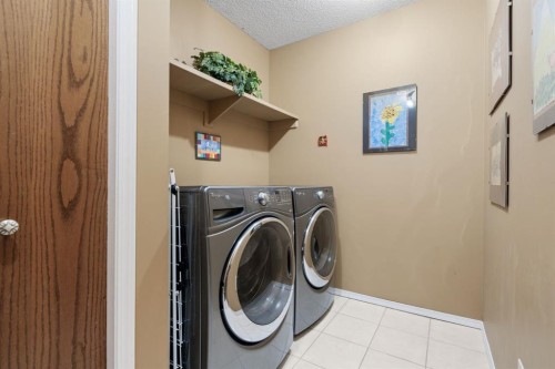 212 Sirocco Place Sw, Calgary, AB - Indoor Photo Showing Laundry Room