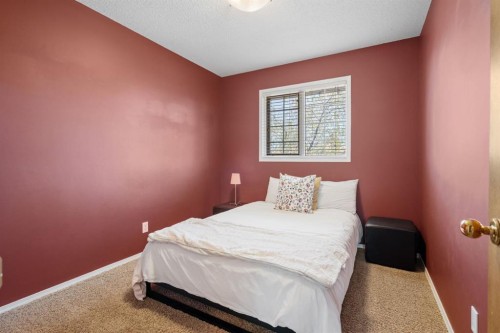 212 Sirocco Place Sw, Calgary, AB - Indoor Photo Showing Bedroom
