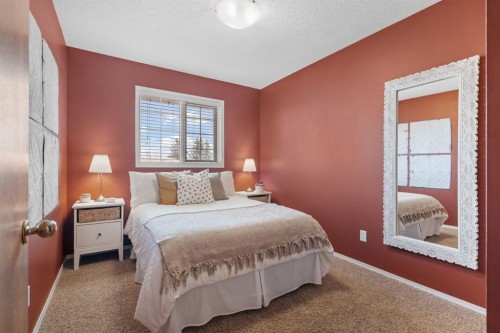 212 Sirocco Place Sw, Calgary, AB - Indoor Photo Showing Bedroom