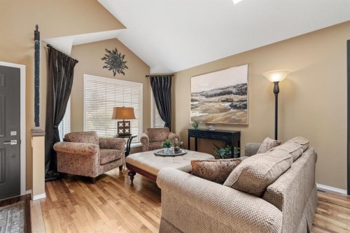 212 Sirocco Place Sw, Calgary, AB - Indoor Photo Showing Living Room With Fireplace