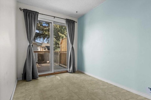 96 Jensen Crescent Ne, Airdrie, AB - Indoor Photo Showing Other Room