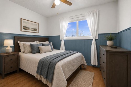 96 Jensen Crescent Ne, Airdrie, AB - Indoor Photo Showing Bedroom
