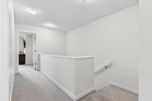 1303 New Brighton Park Se, Calgary, AB - Indoor Photo Showing Other Room