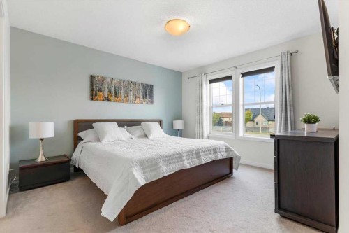 1303 New Brighton Park Se, Calgary, AB - Indoor Photo Showing Bedroom