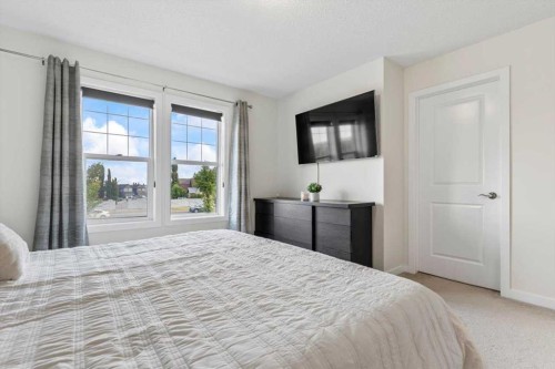 1303 New Brighton Park Se, Calgary, AB - Indoor Photo Showing Bedroom