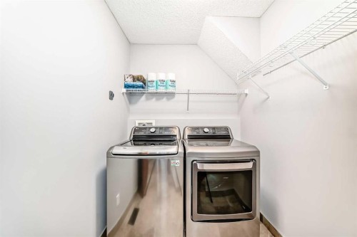 2 Tuscany Estates Crescent Nw, Calgary, AB - Indoor Photo Showing Laundry Room