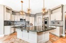 2 Tuscany Estates Crescent Nw, Calgary, AB  - Indoor Photo Showing Kitchen With Upgraded Kitchen 