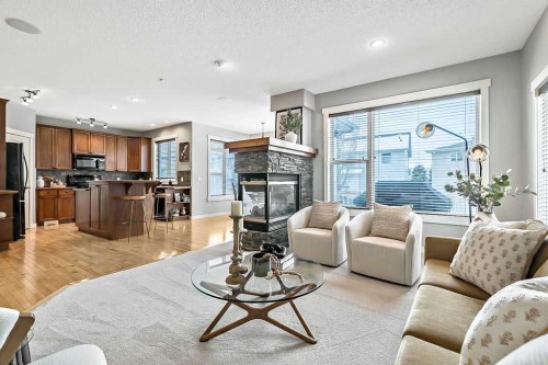 87 Chaparral Grove Se, Calgary, AB - Indoor Photo Showing Living Room With Fireplace