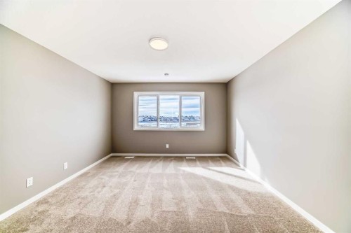 1093 Sawgrass Link Nw, Airdrie, AB - Indoor Photo Showing Other Room
