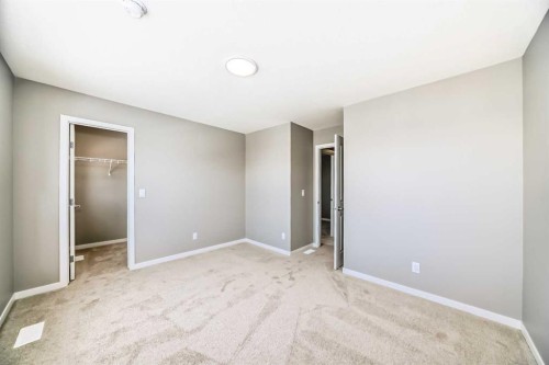 1093 Sawgrass Link Nw, Airdrie, AB - Indoor Photo Showing Other Room