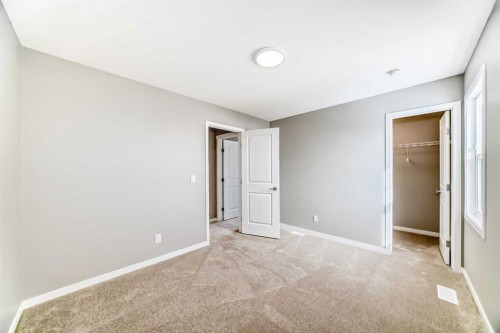 1093 Sawgrass Link Nw, Airdrie, AB - Indoor Photo Showing Other Room