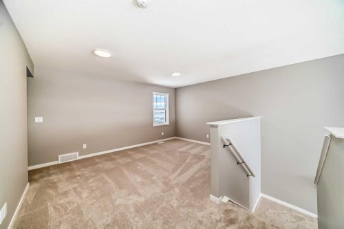 1093 Sawgrass Link Nw, Airdrie, AB - Indoor Photo Showing Other Room