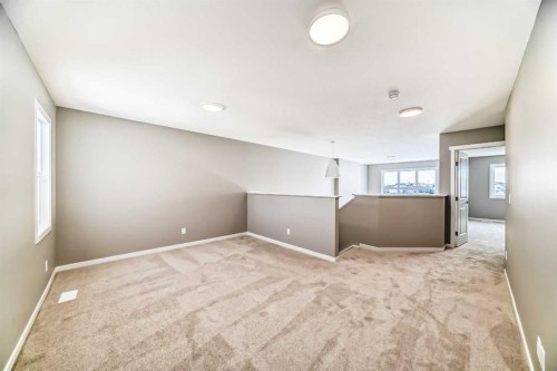 1093 Sawgrass Link Nw, Airdrie, AB - Indoor Photo Showing Other Room