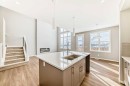 1093 Sawgrass Link Nw, Airdrie, AB  - Indoor Photo Showing Kitchen With Double Sink 