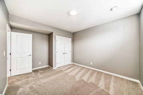 1093 Sawgrass Link Nw, Airdrie, AB - Indoor Photo Showing Other Room