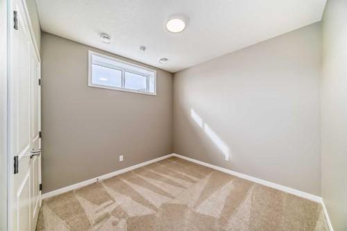 1093 Sawgrass Link Nw, Airdrie, AB - Indoor Photo Showing Other Room