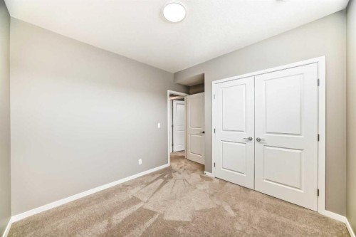 1093 Sawgrass Link Nw, Airdrie, AB - Indoor Photo Showing Other Room